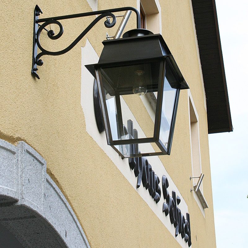 Brass lantern on a hand-forged bracket, Guest House Schiesl