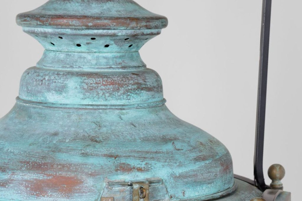 Verdigris patina on a copper lantern top